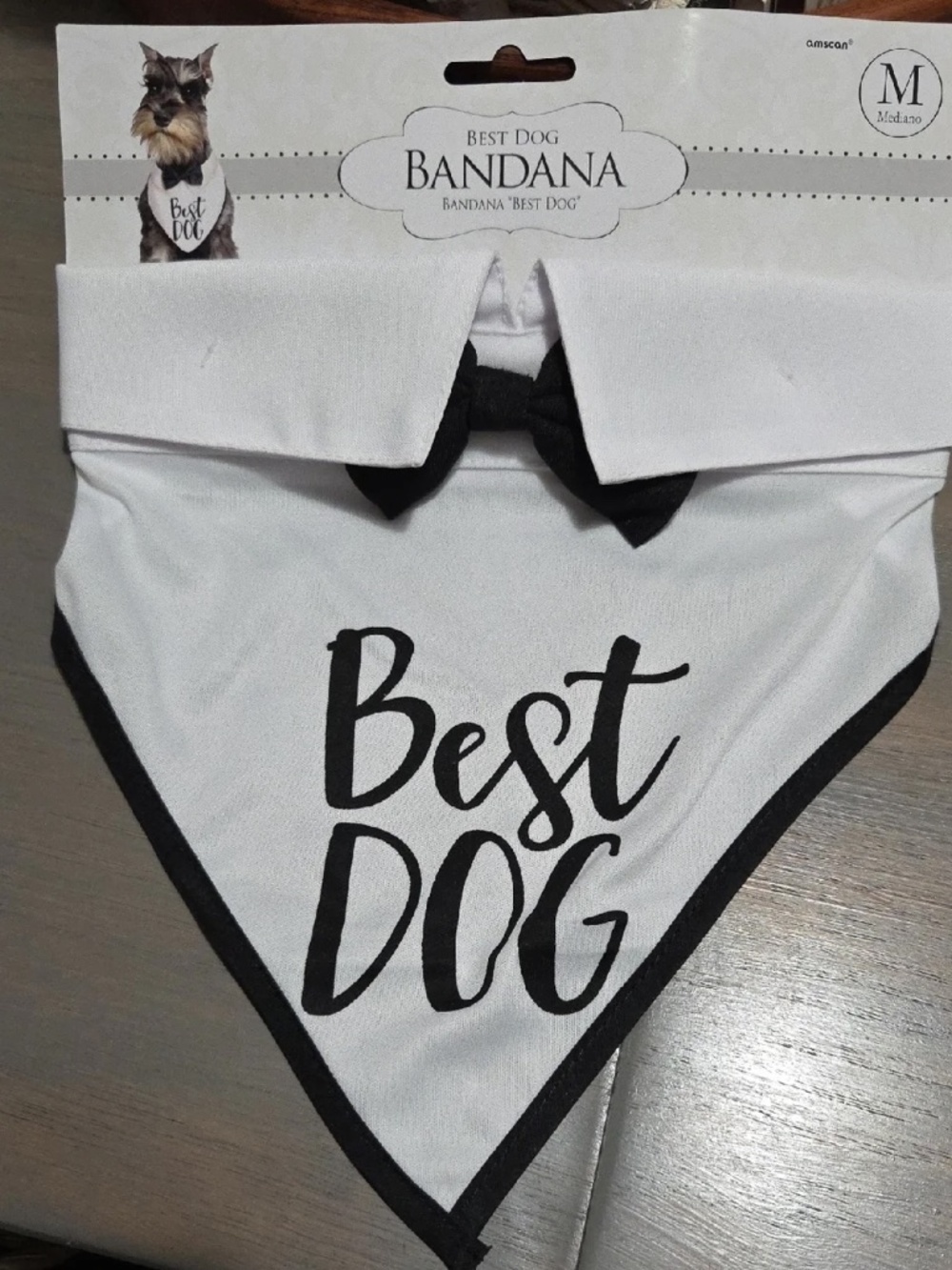 White and black Best Dog bandana collar featuring a matching bow.